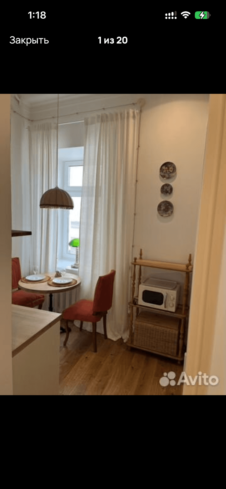 Bright studio apartment with modern decor and large windows